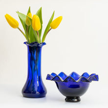 BLUE GLASS VASE AND CENTERPIECE