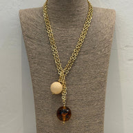 COLLAR SPHERA TRANSPARENTE BOLAS MARFIL Y AMBAR
