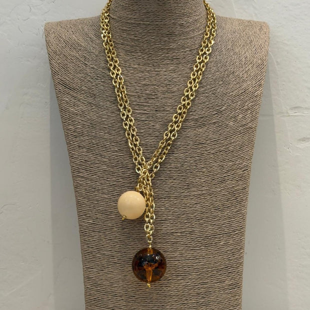COLLAR SPHERA TRANSPARENTE BOLAS MARFIL Y AMBAR