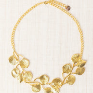 SHORT GOLD-TONE METAL FLOWER NECKLACE
